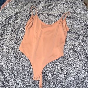 Apricot body suit